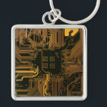 Porte-clés Geek Sortie carte circuit électronique orange PCB<br><div class="desc">PCB Circuit Board cadeaux pour les geeks ou cadeaux pour les nerds. En voici un pour l'Ordinateur Nerd ou Geek en chacun de nous. Geek Sortez votre Nerd avec cette carte circuit électronique PCB. Il s'agit d'une image de fond d'une carte de circuit imprimé ou d'une carte de circuit électronique....</div>