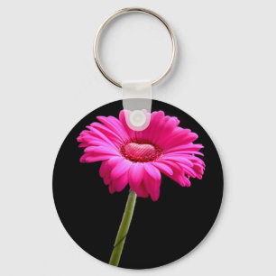Porte-clés Gerbera rose avec le coeur sur l'arrière - plan