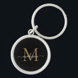 Porte-clés Girl Black Gold Monogramme Nom Élégant Script chic<br><div class="desc">Simple fille Noir Monogramme Or Élégant Chic Moderne Nom Porte - clé initial</div>