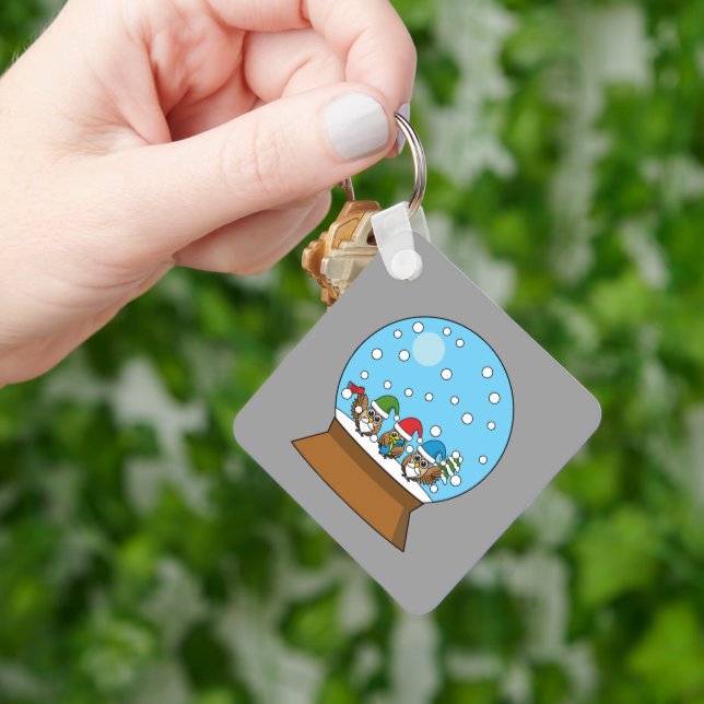 Porte-clés Globe des neiges avec trois Chouettes Gnomes (main)