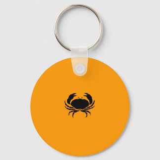 Porte-clés Glow océanique_Crabe noir sur orange