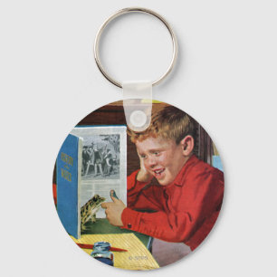 Porte-clés Grenouille dans la bibliothèque