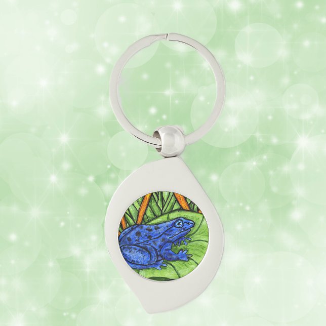 Porte-clés Grenouille vive du poison bleu (Blue poison Frog on green lily pad with yellow reeds grass on keychain.)