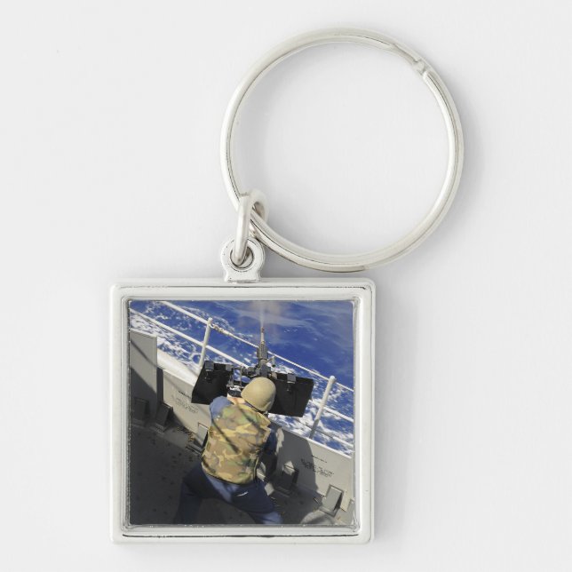 Porte-clés Gunners Mate tirant une mitrailleuse de calibre 50 (Devant)