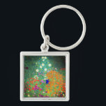 Porte-clés Gustav Klimt Flower Garden<br><div class="desc">Keychain featuring Gustav Klimt’s oil painting Flower Garden (1906). A beautiful garden of purple, red, white, blue, and orange flowers. A great gift for fans of Art Nouveau and Austrian art.</div>