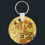 Porte-clés Gustav Klimt Fulfillment Key Chain<br><div class="desc">Gustav Klimt Fulfillment key chain. Frieze from 1909. Completed during Klimt’s golden phase, Fulfillment features an embracing couple holding each other beneath a multi-patterned quilt featuring spirals, eyes, birds, fish and other shapes. The background of the work features the same bronze spirals that would adorn the artist’s renowned Tree of...</div>