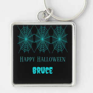 Porte-clés Happy Halloween neon bleu spiderweb noir