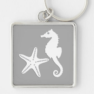 Porte-clés Hippocampe et étoile de mer - blanc sur gris argen