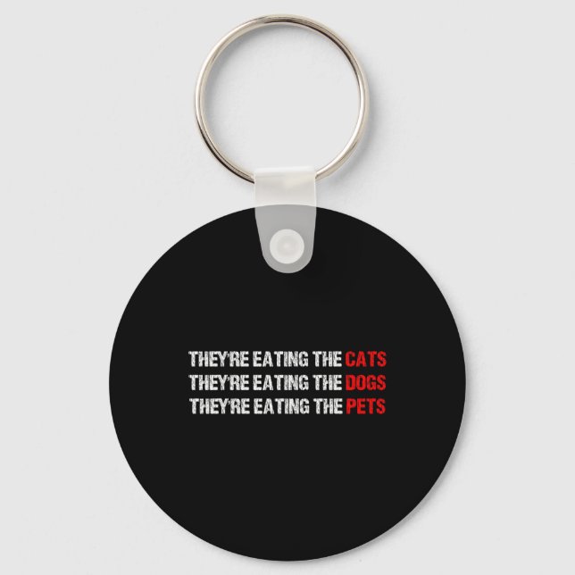 Porte-clés Ils mangent les chiens - Ils mangent les chats (Recto)