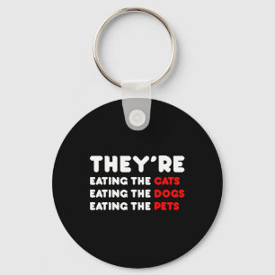 Porte-clés Ils mangent les chiens - Ils mangent les chats