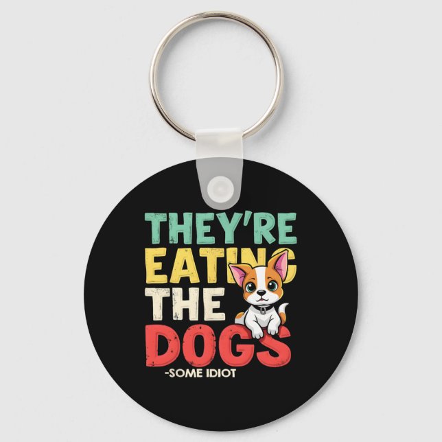 Porte-clés Ils mangent les chiens les chats les animaux de co (Recto)