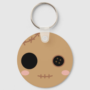 Porte-clés Itami la tête de poupée de vaudou