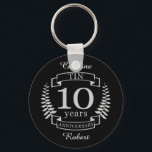 Porte-clés Ivory Traditional wedding anniversary 10 years<br><div class="desc">A design to celebrate 10 years of marriage. This design has a Grey / silver (the traditional color for this anniversary) colored laurel design on a black background. Tin is the traditional gift for this occasion. The text reads Tin 10 years anniversary. A romantic design to celebrate your 10th year...</div>