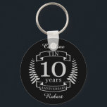 Porte-clés Ivory Traditional wedding anniversary 10 years<br><div class="desc">A design to celebrate 10 years of marriage. This design has a Grey / silver (the traditional color for this anniversary) colored laurel design on a black background. Tin is the traditional gift for this occasion. The text reads Tin 10 years anniversary. A romantic design to celebrate your 10th year...</div>