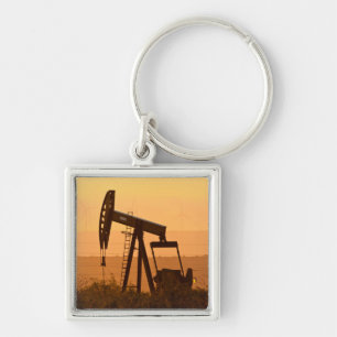 Porte-clés Jack de pompage pompant du pétrole dans l'ouest du