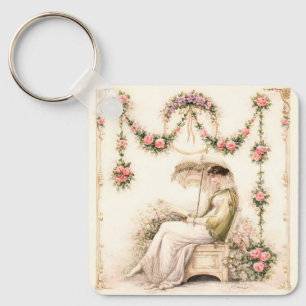 Porte-clés Jardin de roses de la Régence lisant une dame