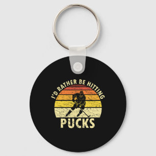 Porte-clés Je préférerais frapper des palets Humour Hockey su