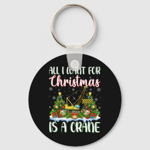 Porte-clés Je Veux Pour Noël Est Une Grue Lumières Des Arbres