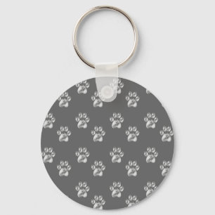 Porte-clés Joli motif de patte élégant sur gris foncé