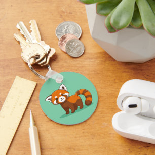 Porte-clés Joli panda roux sur fond vert