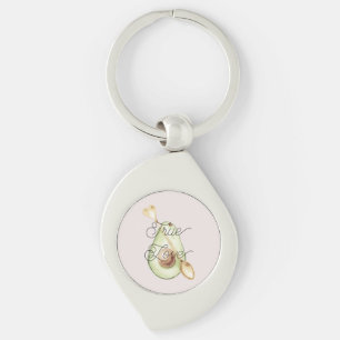 Porte-clés Jolie cuillère en forme de cœur d'avocat rose tend