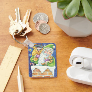 Porte-clés Joyeux Noël, Père Noël dans la cheminée avec des j