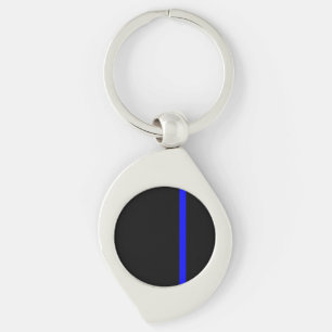 Porte-clés La Ligne Bleue Mince Symbole dans un décor noir
