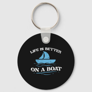 Porte-clés La vie est meilleure sur un bateau à voile proprié