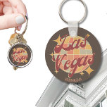 Porte-clés Las Vegas Nevada Retro Vintage Party<br><div class="desc">Las Vegas Nevada Retro Vintage Design avec une boule disco dans les tons marron clair,  rose et bleu clair. Ce magnifique porte - clé est un cadeau,  un souvenir ou un article de mode parfait pour les résidents de Las Vegas City,  les visiteurs,  les touristes ou les fans.</div>
