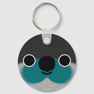 Porte-clés Le visage d'une perruque Turquoise à joue verte