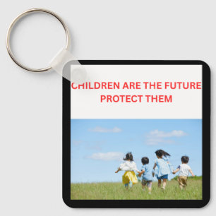 PORTE-CLÉS LES ENFANTS SONT L'AVENIR PROTÉGEZ-LES 