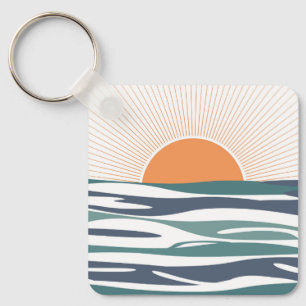 Porte-clés Lever du soleil au bord de la mer