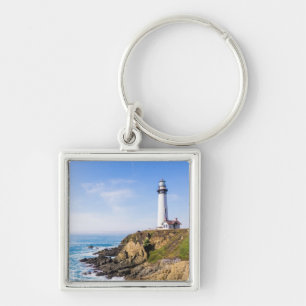 Porte-clés Lighthouse on hill blue sky white house ocean