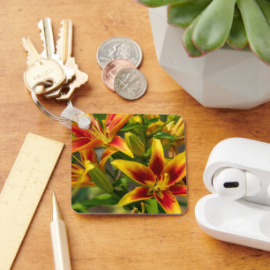 Porte-clés Lis des jours, floraisons dorées orange estivales