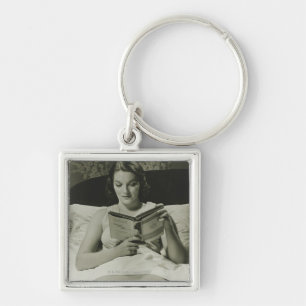 Porte-clés Livre de lecture de femme