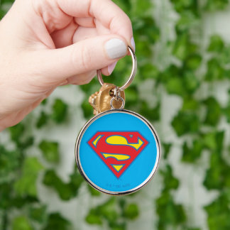 Porte-clés Logo classique Supergirl avec fond bleu