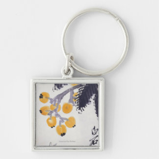 Porte-clés Loquats et une sauterelle