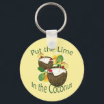 Porte-clés Luau Tropical Party Funny Porte - clé de boisson d<br><div class="desc">Illustration graphique d'une boisson à la noix de coco pour une fête tropicale par l'artiste et designer Charmaine Paulson sur un porte - clé. Le porte - clé a le texte "Mets la chaux dans la noix de coco". ©2012charmainepaulson</div>