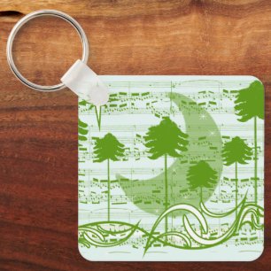 Porte-clés Lune céleste et pins verts musicaux 