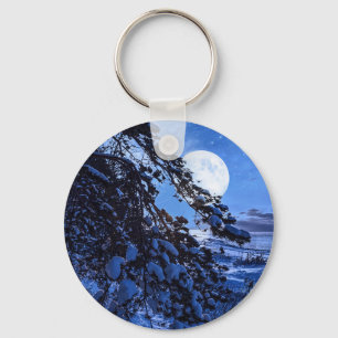 Porte-clés Lune sur le sapin enneigé et la côte de la mer la