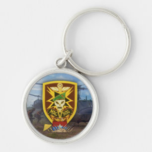 Porte-clés MACV SOG MACSOG Vietnam timbre de guerre