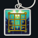 Porte-clés MAGIC SQUARE 33 , Gold Aqua Blue Turquoise<br><div class="desc">The numbers are placed so that the sum of each line (horizontal sense ), each column (vertical sense ) , and each diagonal of the “ Magic Square “ the result is always 33. Idea and calculation by Alessandro Lumini , design and modeling by Bulgan Lumini. Part from series Hyper...</div>