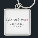 Porte-clés Mariage Groomsman élégant<br><div class="desc">Le cadeau parfait pour n'importe quel groomsman, le design amusant et moderne dispose de script de typographie stylisée police "Groomsman" libellé avec un mignon petit coeur d'amour rouge arrêts complets. Le design est facile à personnaliser avec un nom et une date de mariage établie et sera le gardien parfait de...</div>