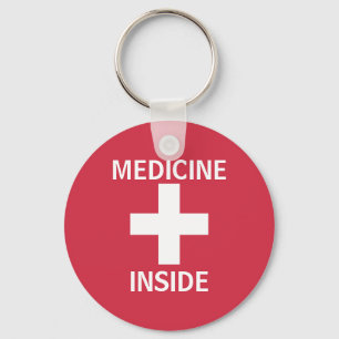 Porte-clés Médecine rouge à l'intérieur du symbole des premie