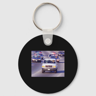 Porte-clés Mème de poursuite en voiture de police de Trump et