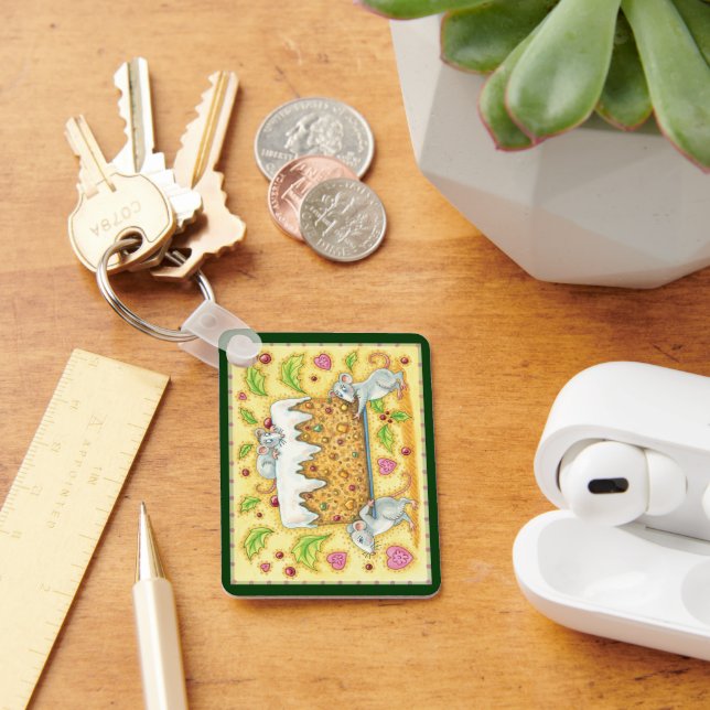 Porte-clés Mignonne souris de Noël portant un dessert de gâte (Bureau)