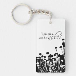 Porte-clés Miracle de récupération, noir et blanc