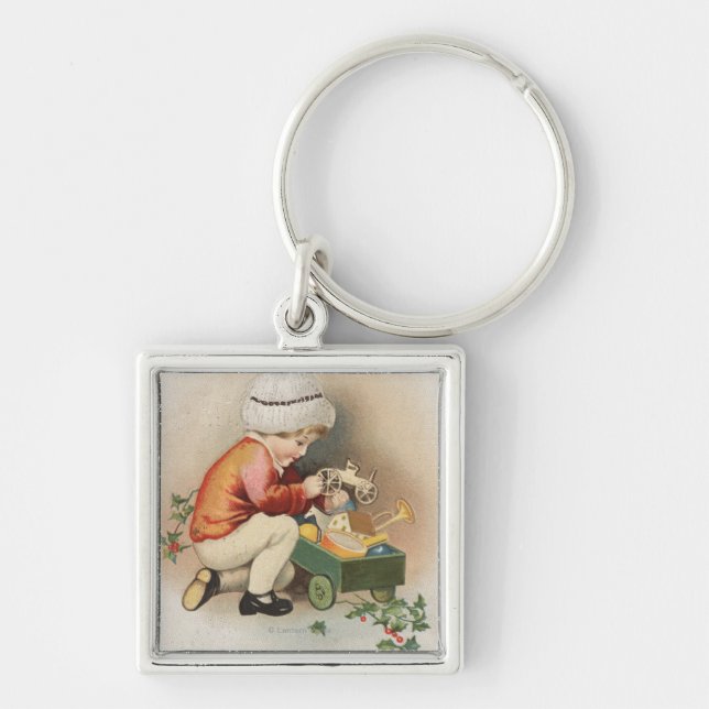 Porte-clés Mon voeu de Noël Enfant observant les jouets (Devant)