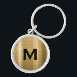 Porte-clés Monogramme classique noir et or<br><div class="desc">Porte - clé Monogramme Noir et Or Classique Personnalisé Monogramme Or Initial Arrière - plan Métallique Brossé. Parfait comme cadeau de vacances,  faveurs de réunion familiale,  merci cadeau pour les groomsmen et cadeau pour toutes les occasions spéciales.</div>