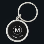 Porte-clés Monogramme classique noir minimal<br><div class="desc">Le porte - clé rond monogrammé minimal dispose d'un arrière - plan noir avec votre initiale et votre nom dans la typographie de bloc classique en blanc pour un look professionnel classique simple.</div>